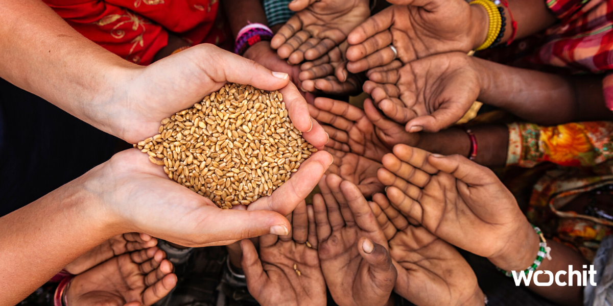 woman providing food to children